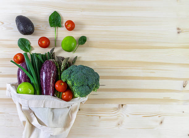 istock Textile cotton bag with veggies 1256449179