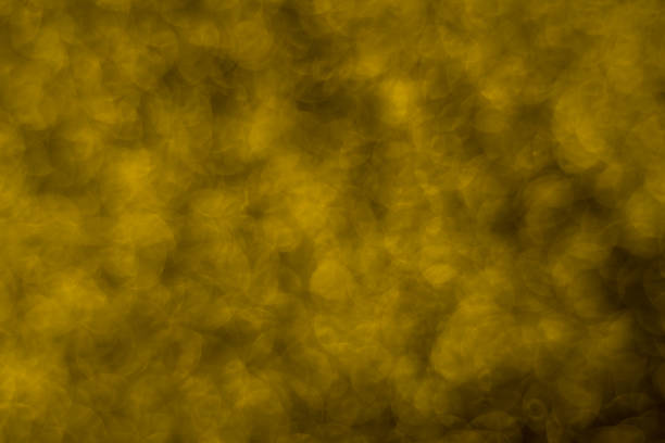 istock Abstract christmas lights glitter background. christmas gold texture background 1256450318