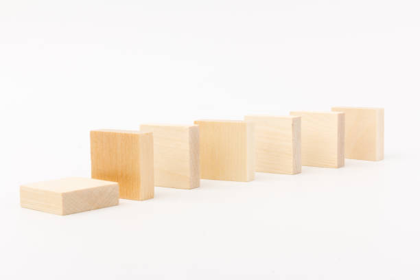 istock Wooden block toy  isolated over white background. space for text 1256450646