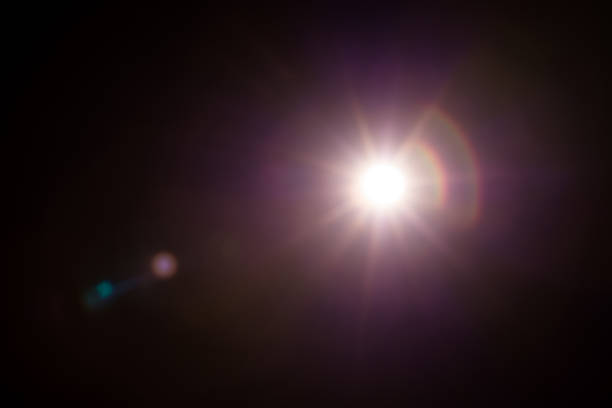 istock Abstract Natural Sun flare on the black 1256451865
