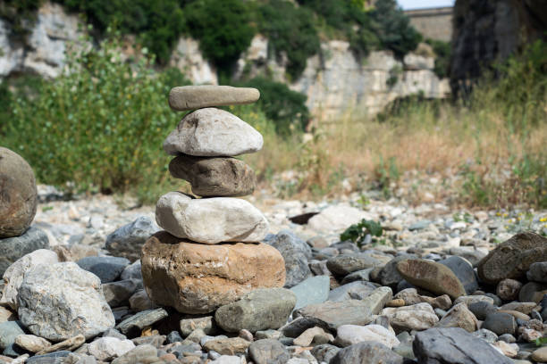 istock stone balance in the dry river 1256453428