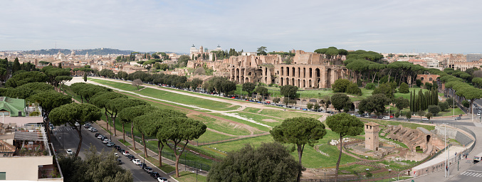 View of the ancient Roman Circo Massimo hippodrome theater, with the ruins of the palace of Domitian on the Palatine Hill, in Rome, Italy