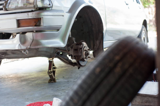 istock Cars with front wheels and brakes have problems which are fixed in the garage. 1256459200