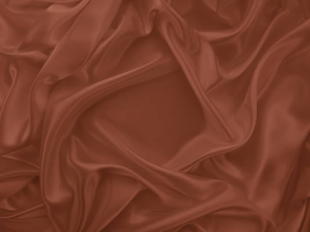 istock Beautiful elegant wavy brown satin silk luxury cloth fabric texture. 1256459841