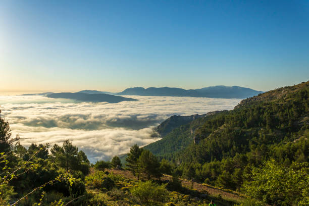 istock Sunrise views from the Montcabrer mountain with Cocentaina castle at right, Cocentaina, Alicante, Spain. 1256469092