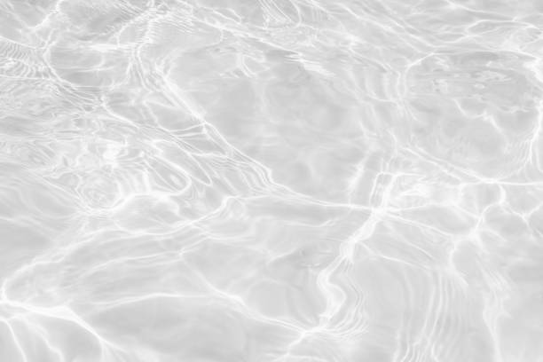 istock desaturated transparent clear calm water surface texture 1256470946