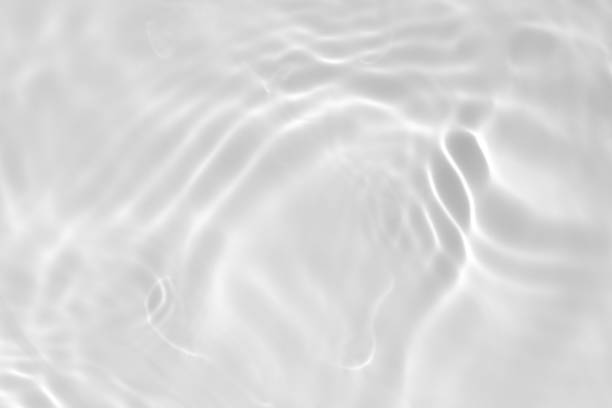 istock desaturated transparent clear calm water surface texture 1256471117