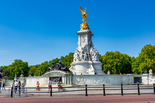 London, England - Aug 25, 2019: Queen Victoria Memorial in front of Buckingham Palace at London, England. Golden angel.