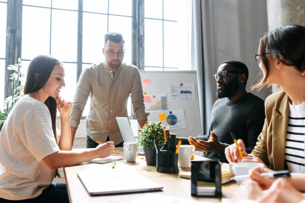 istock Morning meeting in contemporary office 1256477074