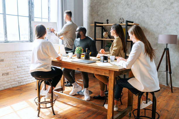 istock Brainstorming in a multiracial team in office 1256477080