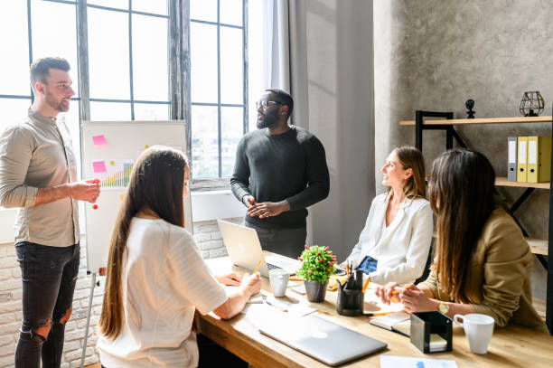 istock Brainstorming in multiracial team in office 1256477095