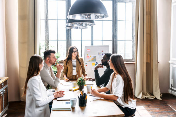 istock Morning meeting in contemporary office 1256477112