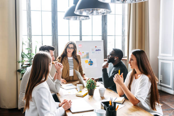 istock Morning meeting in contemporary office 1256477119