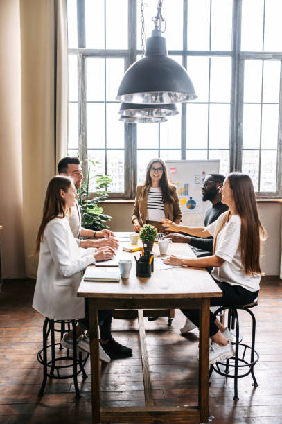 istock Morning meeting in contemporary office 1256477131