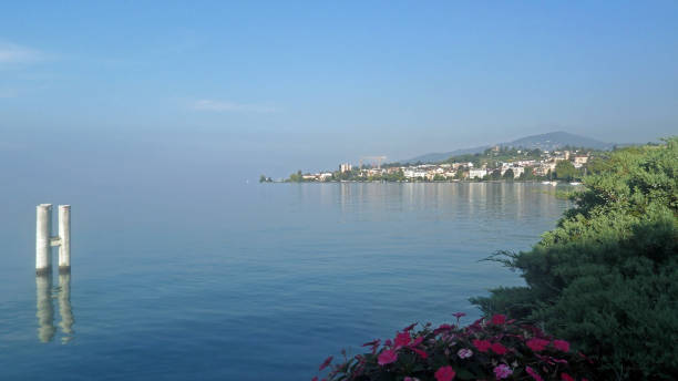 istock Switzerland landscape with lake and mountains 1256477927