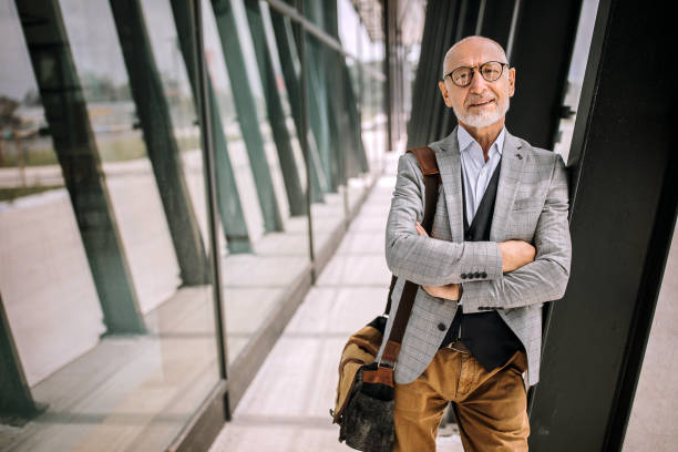 istock Successful senior businessman smiling 1256479372