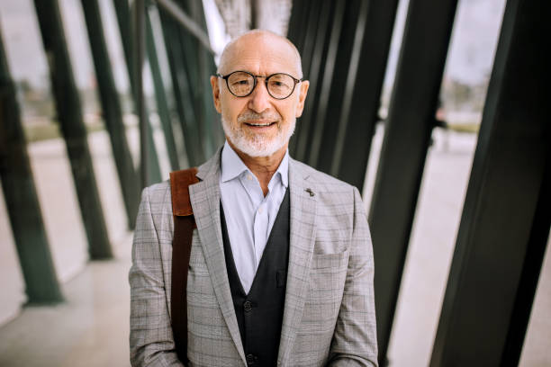 istock Successful senior businessman smiling 1256479396
