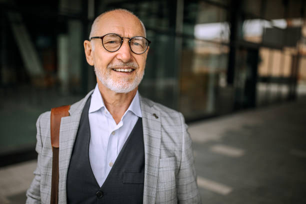 istock Successful senior businessman smiling 1256479444