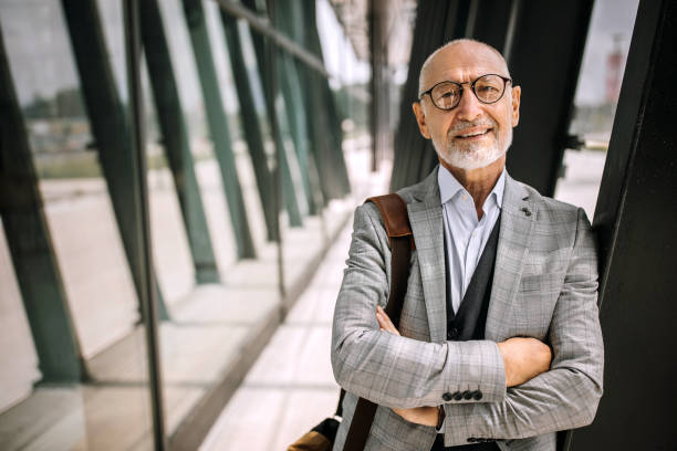 istock Successful senior businessman smiling 1256479488