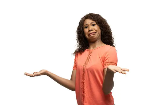 Photo of Young african-american woman with funny, unusual popular emotions and gestures isolated on white studio background