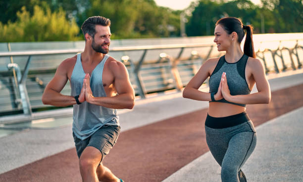 istock Couple doing sport on the street 1256489308