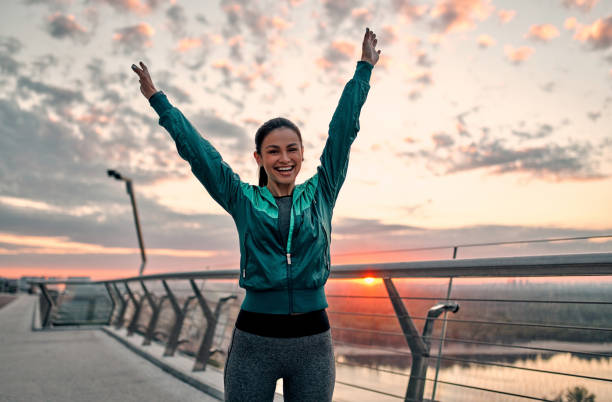 istock Woman doing sport on street 1256489335