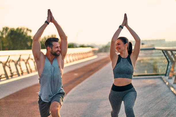 istock Couple doing sport on the street 1256489413