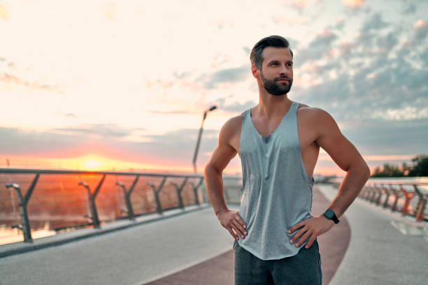 istock Man doing sport on street 1256489507