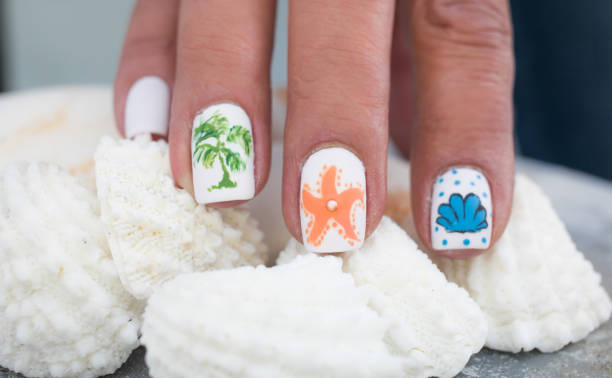 Star Fish and Palm Tree Nail Art Design Beach Themed Art starfish nails stock pictures, royalty-free photos & images