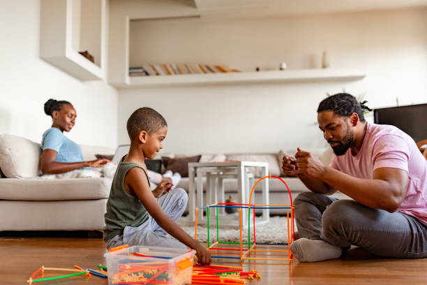 istock Father and son having fun with creative toys 1256489768