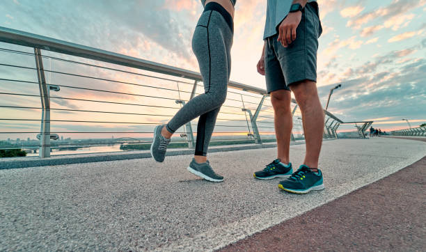 istock Couple doing sport on the street 1256489814