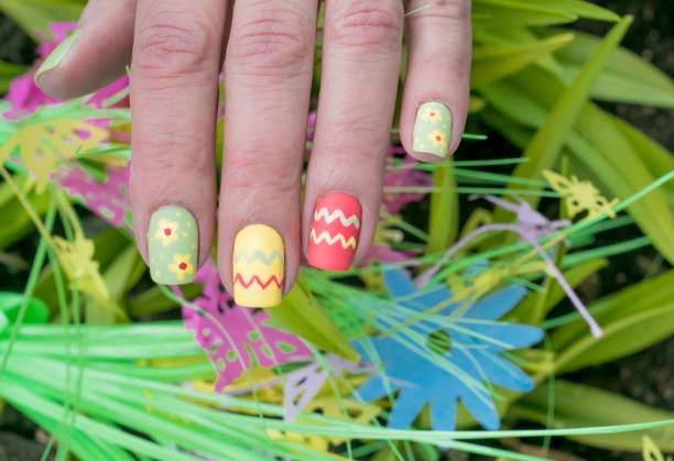 istock Easter Egg and Flower Nail Art Design 1256489833