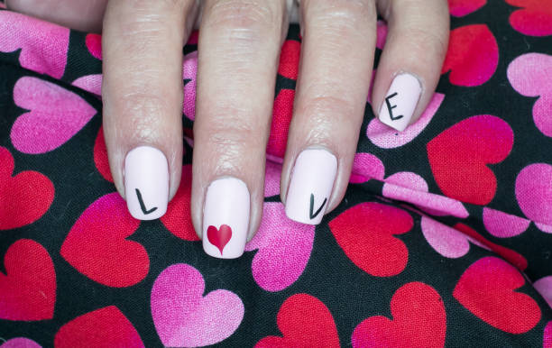 istock Love and Hearts Nail Art Design 1256489905