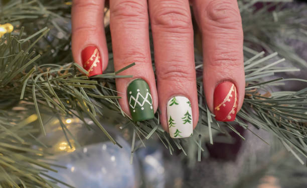 Christmas Tree Nail Art Design Holiday Inspired Art christmas nails stock pictures, royalty-free photos & images