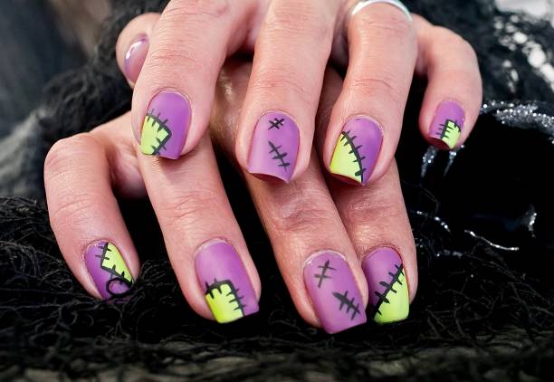 Halloween Patches Nail Art Design Halloween Inspired Art hand massage photos stock pictures, royalty-free photos & images