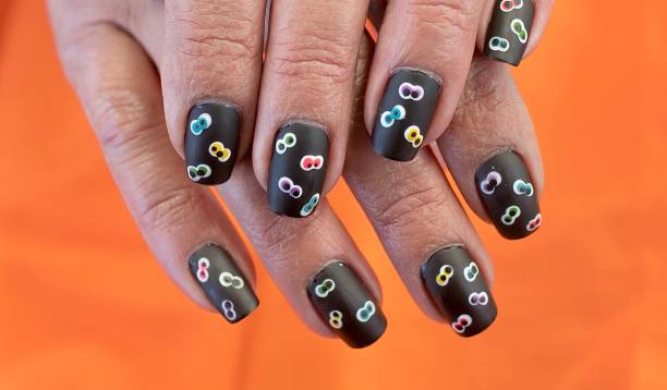 istock Googly Eyes Nail Art Design 1256489971