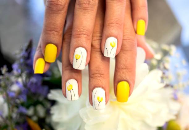 istock Yellow Flower Nail Art Design 1256490014