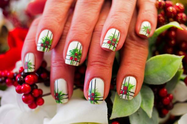 Christmas Holly Nail Art Design Holiday Inspired Art christmas nails stock pictures, royalty-free photos & images