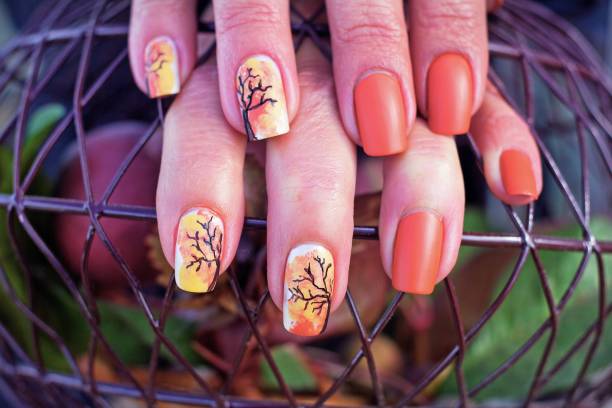 Fall Trees Nail Art Design Leaves Falling Inspired Art fall nail art stock pictures, royalty-free photos & images