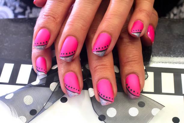 istock Hot Pink Polka Dot Nail Art Design 1256490065