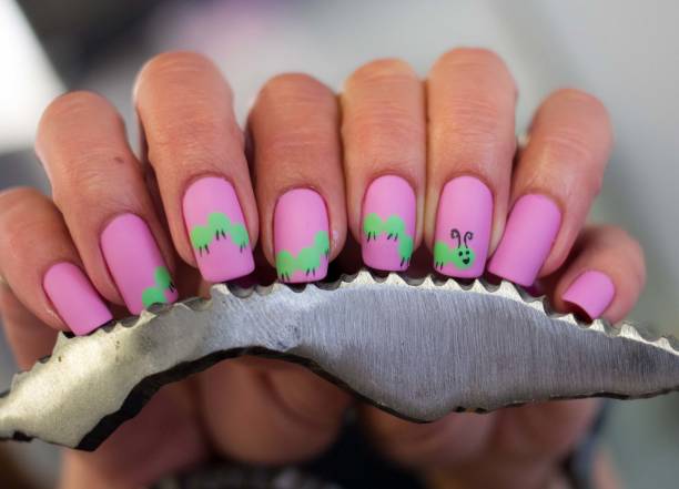 istock Caterpillar Crawling Nail Art Design 1256490103