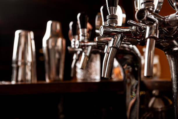 istock Metal taps for craft beer and bartender tools in interior of pub 1256492553