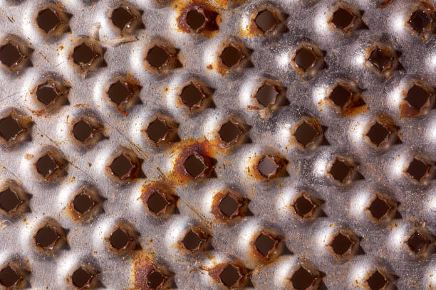 istock Iron's background rusty grater. Close-up. Macro effect photo 1256492608