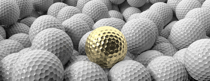 Golf ball golden on golf balls background, banner, close up view, Golfing sport champion, winner concept. 3d illustration
