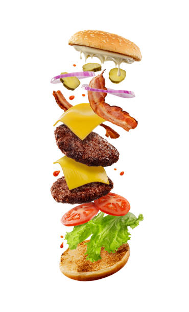 istock Layers of double cheeseburger isolated on white background 1256493781
