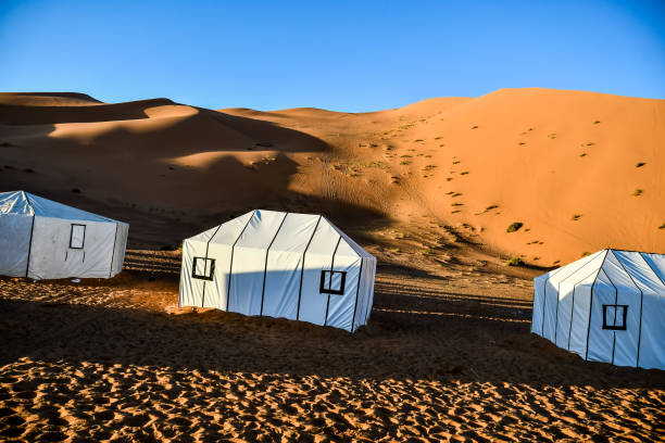 istock house in the desert, photo as background 1256502100