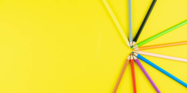 istock Colorful pencil for drawing on yellow background. Top view with copy space. Workplace in the office. Office background. 1256517057