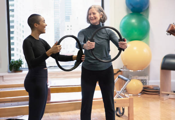istock Senior Woman exercising 1256519266