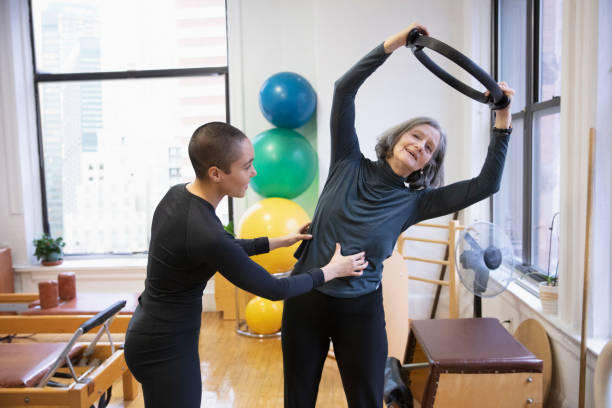 istock Senior Woman exercising 1256519299