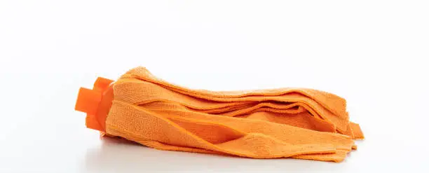 Photo of Cleaning floor mop isolated against white background.